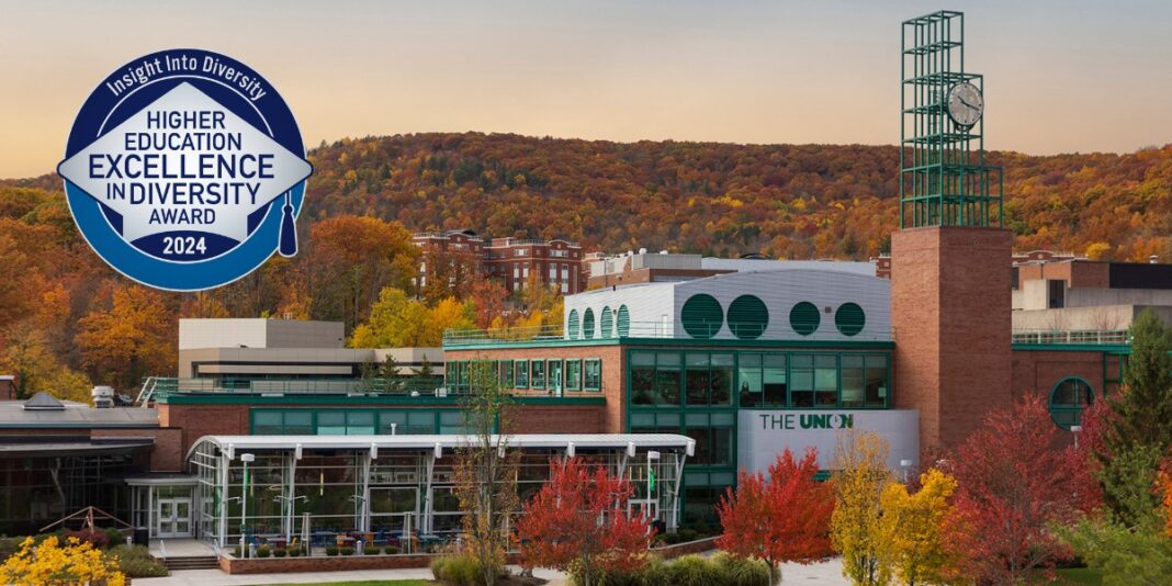 Award emblem over autumnal university campus view