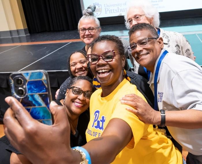 Group selfie at University of Pittsburgh event